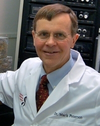 Mark E. Peterson